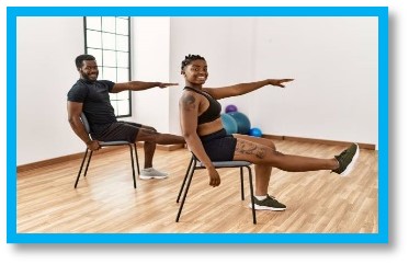 two people sitting in chairs doing calistenics